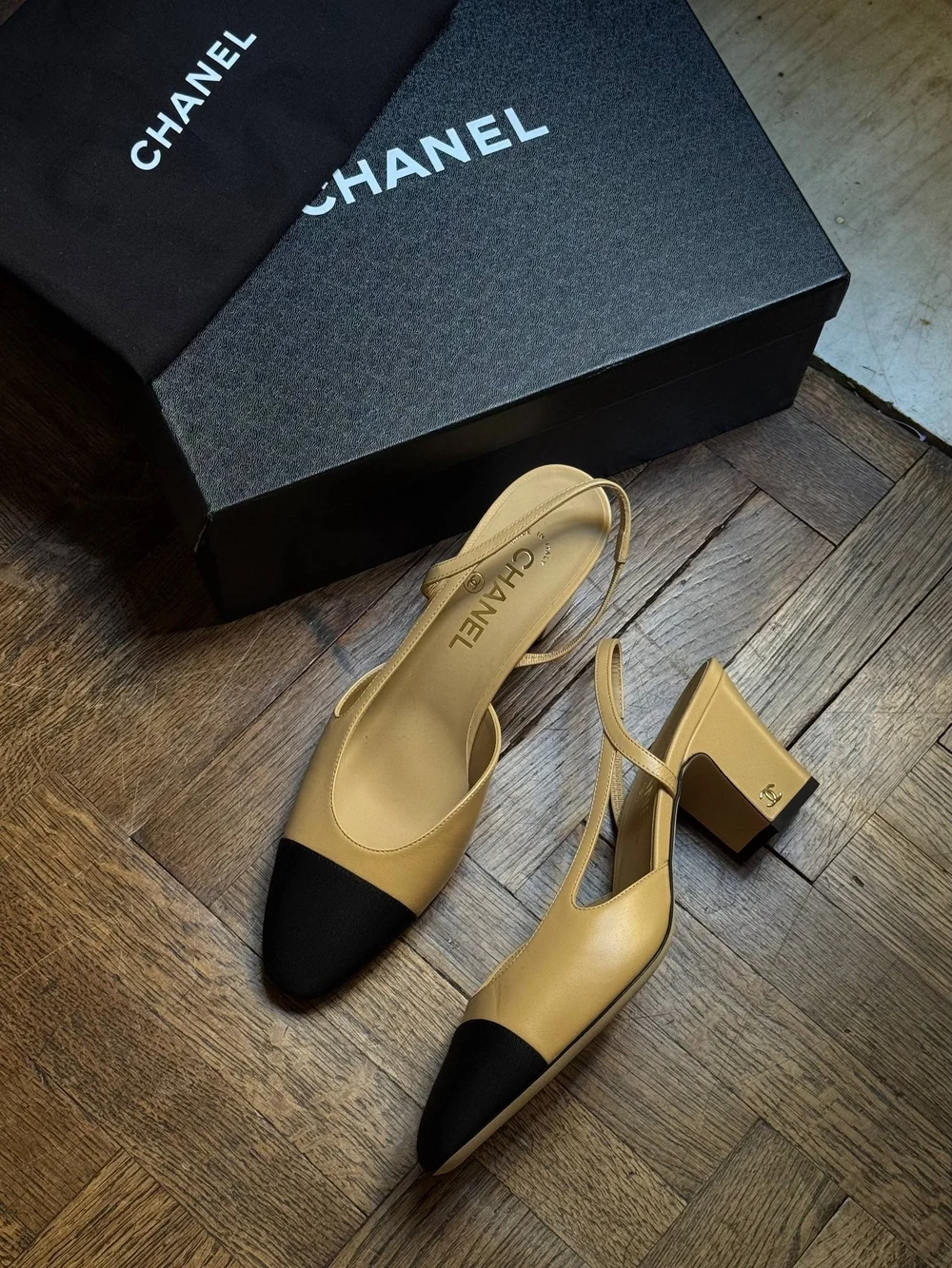 CHANEL Beige Slingback Pumps with Black Cap Toe